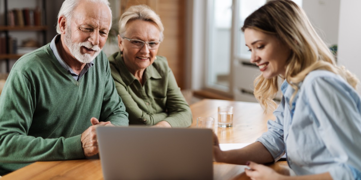 Elderly couple with insurance agent