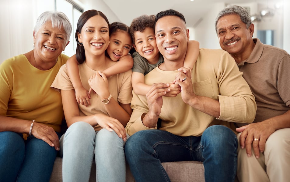 happy family on couch for group photo