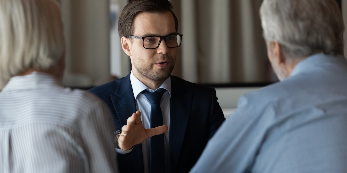 agent discussing life insurance awareness month